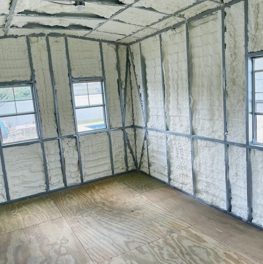 Closed-cell spray foam insulation applied to wall cavities in a residential project in Vine Grove